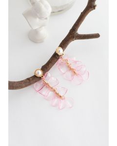 Aretes colgantes de perlas con pétalos de plástico en rosa